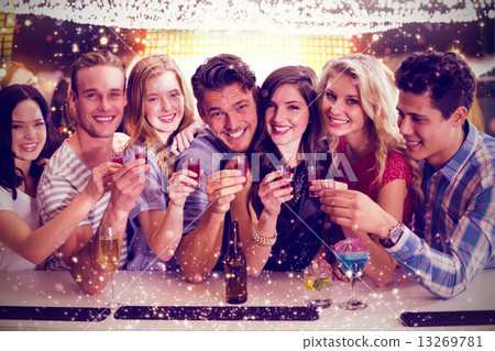 Composite image of friends with drinks 13269781