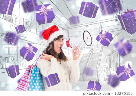 Composite image of festive brunette holding megaphone and bags 13270193