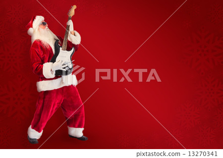 Composite image of santa pushes a shopping cart Composite image of santa pushes a shopping cart 13270341