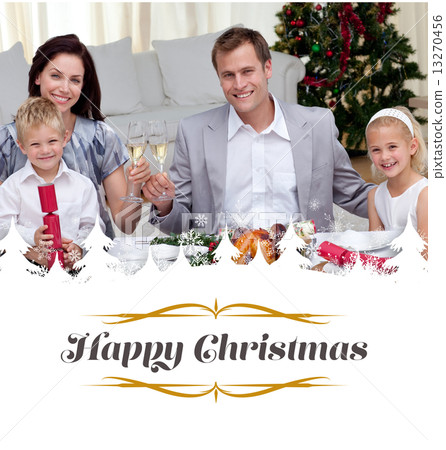 Composite image of parents toasting with wine in christmas dinne 13270456
