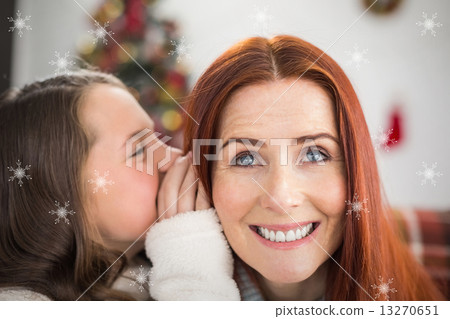 Composite image of daughter telling her mother a christmas secre 13270651