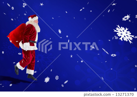 Composite image of santa claus carrying sack 13271370