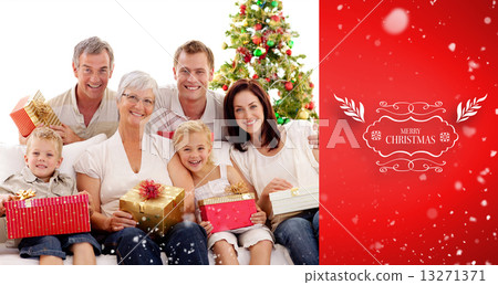 Composite image of family holding christmas presents at home Composite image of family holding christmas presents at home 13271371