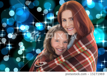 Composite image of mother and daughter under blanket Composite image of mother and daughter under blanket 13271969