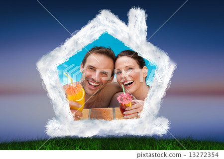 Composite image of beautiful couple drinking cocktails in the sw 13272354