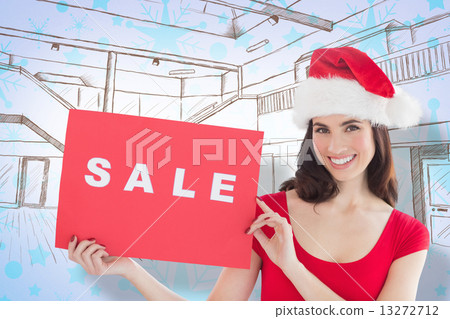 Composite image of festive brunette with sale sign Composite image of festive brunette with sale sign 13272712