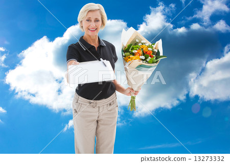 Composite image of happy flower delivery woman looking for signa 13273332