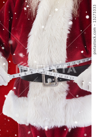 Composite image of santa claus measures his belly Composite image of santa claus measures his belly 13273333