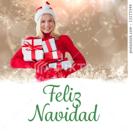 Composite image of happy festive blonde with gift 13273344