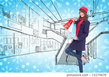 Composite image of happy brunette in winter clothes holding shop Composite image of happy brunette in winter clothes holding shop 13274676