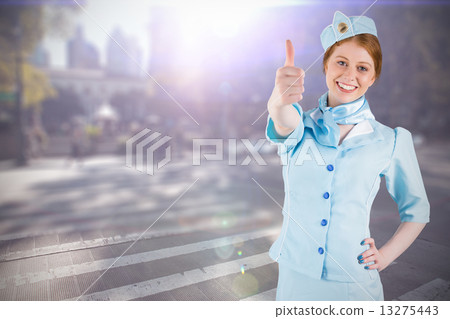 Composite image of pretty air hostess with hand on hip 13275443