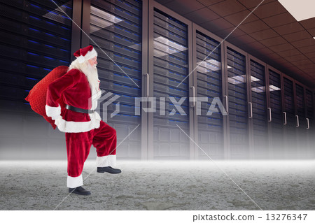 Composite image of santa carrying sack of gifts 13276347