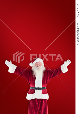 Composite image of jolly santa opens his arms to camera Composite image of jolly santa opens his arms to camera 13276396