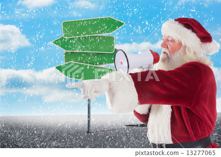 Composite image of santa points at something and uses a megaphon 13277065