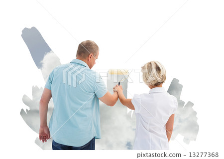 Composite image of happy older couple painting a sky Composite image of happy older couple painting a sky 13277368
