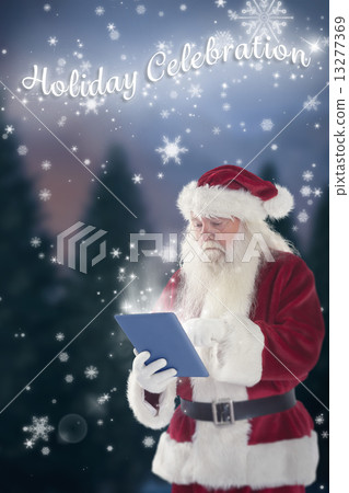 Composite image of santa uses a tablet pc 13277369