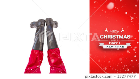 Composite image of lower half of santas legs with his black boot 13277477