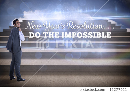 Composite image of smiling businessman standing 13277921