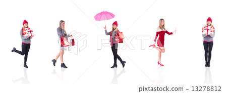 Composite image of festive blonde holding pile of gifts Composite image of festive blonde holding pile of gifts 13278812