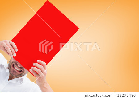 Composite image of festive man holding christmas gift Composite image of festive man holding christmas gift 13279486
