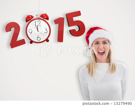 Composite image of stressed blonde in santa hat Composite image of stressed blonde in santa hat 13279490