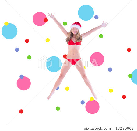 Composite image of festive fit blonde in red bikini Composite image of festive fit blonde in red bikini 13280002