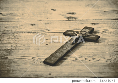 Old cross with jesus on the old floor 13281071