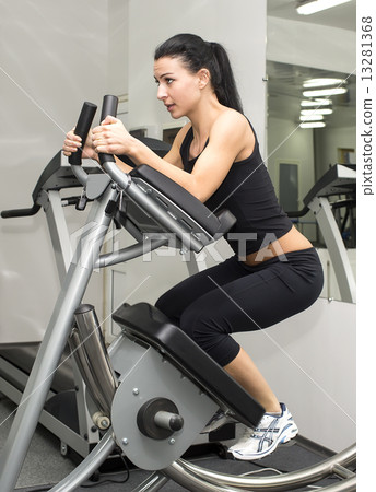 young girl goes in for sports in the gym young girl goes in for sports in the gym 13281368