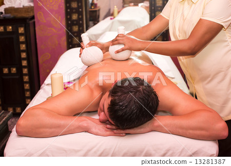 man engaged in Ayurvedic spa treatment man engaged in Ayurvedic spa treatment 13281387