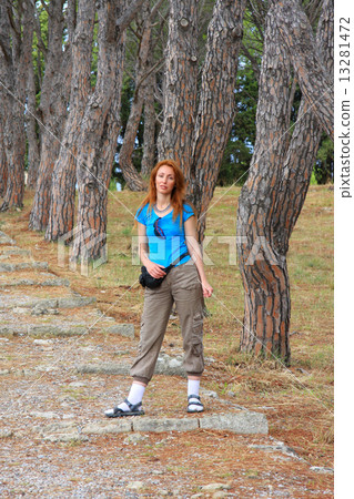 The girl  tourist on the track in park on a grief Filerimos. Rhodes. Greece.. 13281472
