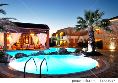 Outdoor restaurant during sunset at the luxury hotel, Pieria, Gr Outdoor restaurant during sunset at the luxury hotel, Pieria, Gr 13283957