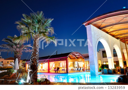 Outdoor restaurant during sunset at the luxury hotel, Pieria, Gr Outdoor restaurant during sunset at the luxury hotel, Pieria, Gr 13283959