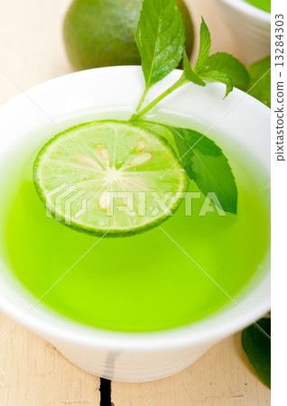 mint infusion tea tisane with lime 13284303