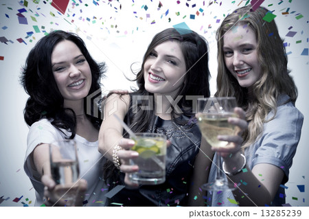 Composite image of friends with drinks Composite image of friends with drinks 13285239