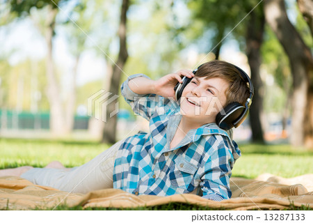 Boy in park Boy in park 13287133
