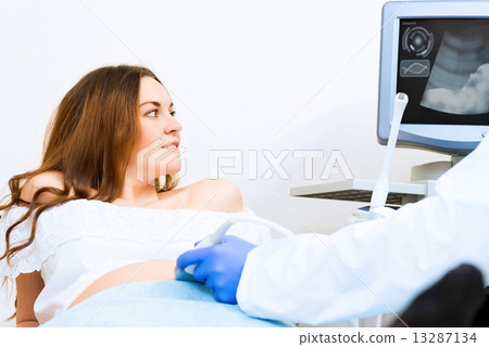 pregnant woman on reception at the doctor pregnant woman on reception at the doctor 13287134