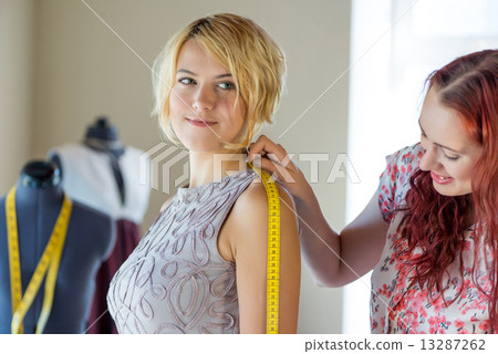 Dressmaker at work Dressmaker at work 13287262