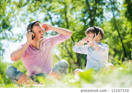 Father and son in park 13287338