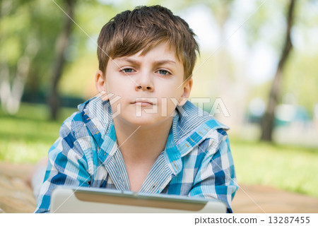 Boy in summer park Boy in summer park 13287455