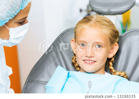 Dentist inspecting patient 13288135