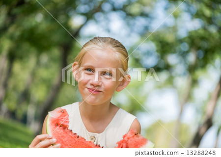 Kid with watermelon slice 13288248