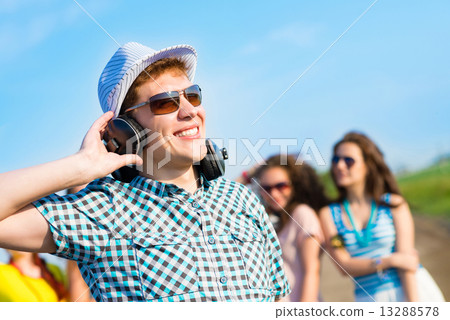 young man in sunglasses young man in sunglasses 13288578