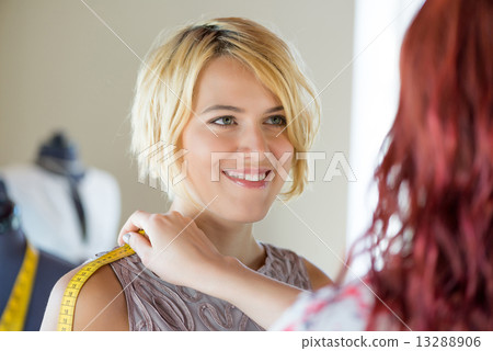Dressmaker at work Dressmaker at work 13288906