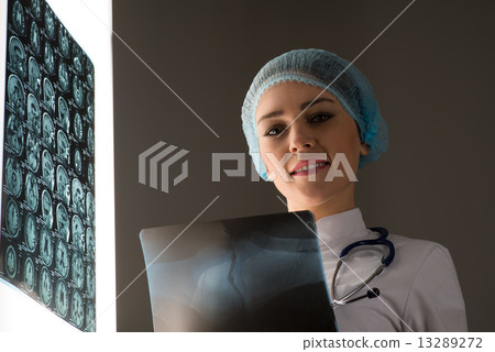 doctor looking at the x-ray doctor looking at the x-ray 13289272