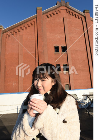 A woman drinking a drink A woman drinking a drink 13289941