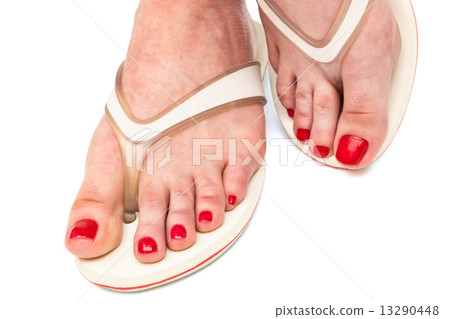 a female foot in thongs 13290448