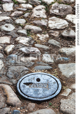 a manhole cover a manhole cover 13290464