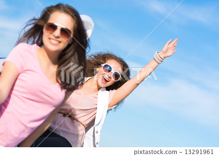 young attractive woman in sunglasses 13291961