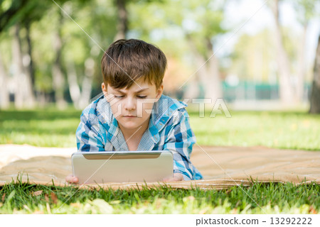 Boy in summer park 13292222