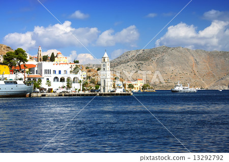 Greece. Dodecanesse. Island Symi (Simi). Colorful houses on rocks... 13292792